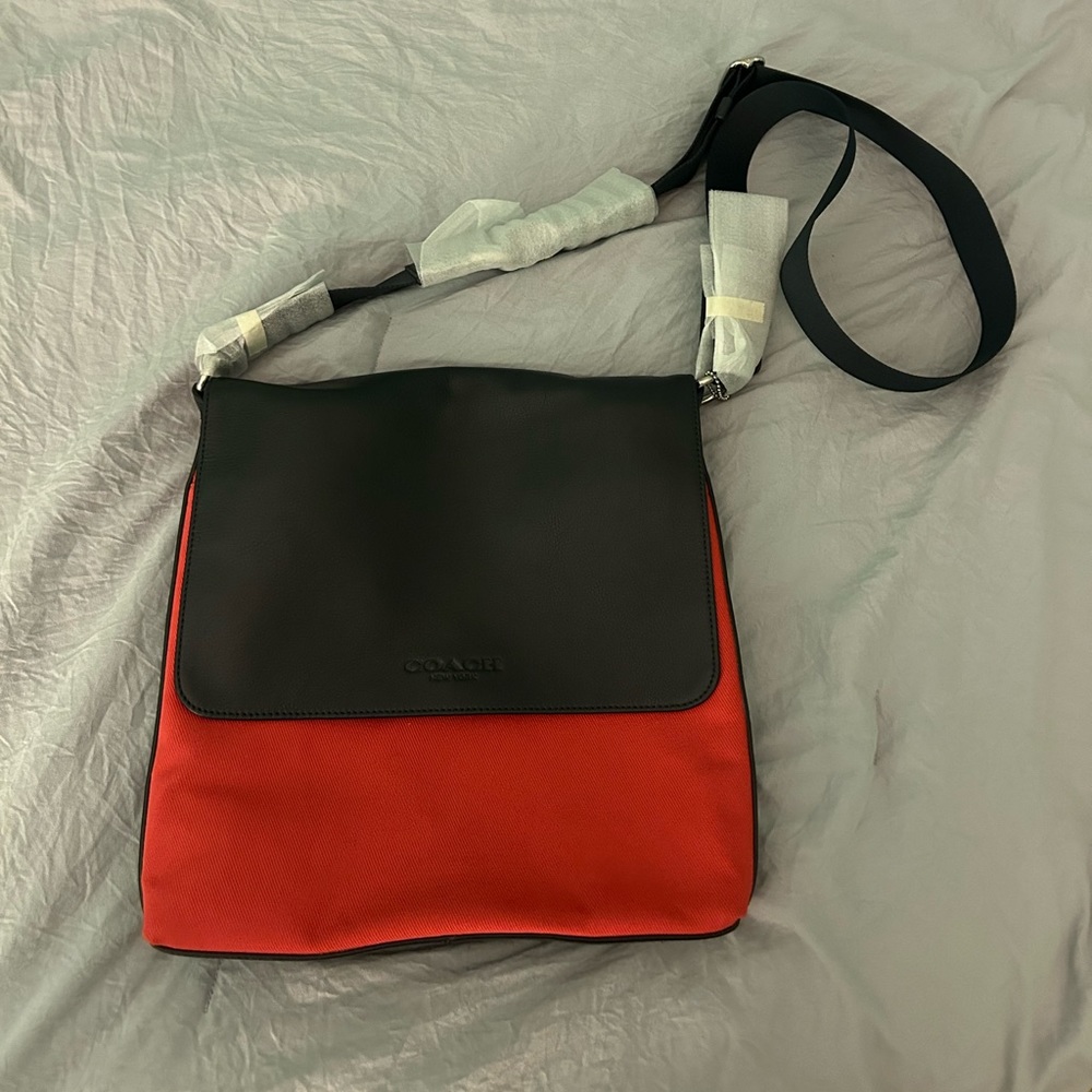 Coach men’s map bag crossbody in coral